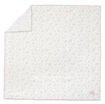 The Tartine et Chocolat Cotton Swaddle features a square white design adorned with a subtle floral pattern, delicate pink stitching along the edges, and a dainty pink bow in one corner—making this charming blanket an essential for any nursery, perfect for keeping your baby cozy and comfortable.