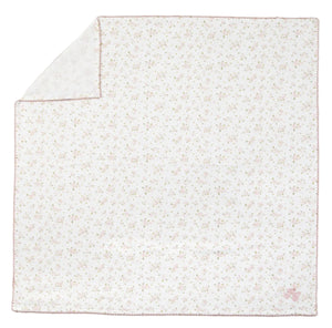 The Tartine et Chocolat Cotton Swaddle features a square white design adorned with a subtle floral pattern, delicate pink stitching along the edges, and a dainty pink bow in one corner—making this charming blanket an essential for any nursery, perfect for keeping your baby cozy and comfortable.