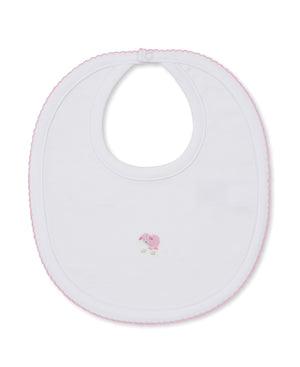 Kissy Kissy Sweet Sheep Bib in white with delicate pink trim and a small embroidered pink sheep at the center, crafted from ultra-soft Pima cotton for your baby’s comfort, laid flat on a white background.