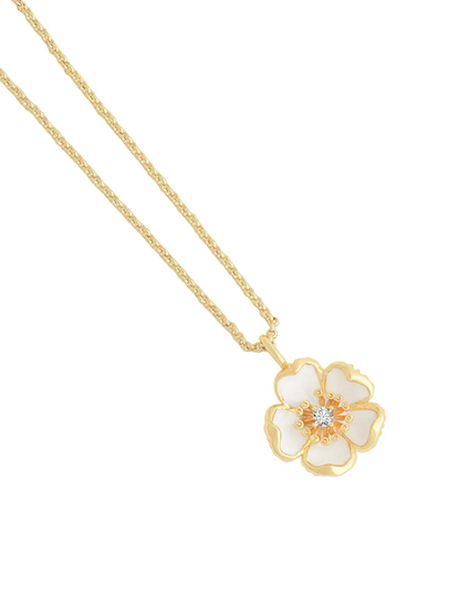 The Anabel Aram Wildflowers Pendant Necklace features a delicate flower-shaped charm with white petals and a central clear gemstone, dipped in 18k gold—perfect for lovers of elegant wildflower styles.