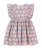 The Konges Slojd Baby Girls’ and Girls’ Kim Frill Dress features short sleeves, ruffled shoulders, a gathered waist, and a charming pink and blue floral pattern.