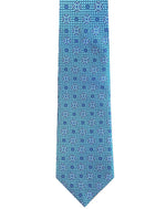 A close-up image of the Robert Jensen Quatrefoil Pattern Tie, a handcrafted necktie in blue adorned with light blue and white geometric designs, showcasing traditional artisans' artistry and elevating personal style.