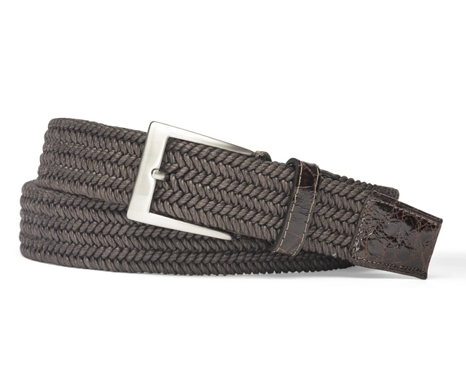 The W. Kleinberg Men's Solid Stretch Belt with Croc Tabs features a braided grey design, a silver rectangular buckle, and a dark brown leather end tip for comfort and style.