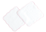 Terry Tots Wash Cloth Set: Two square, white plush wash cloths with scalloped edges and delicate light pink stitching, slightly overlapping on a white background—ideal for gentle cleansing.