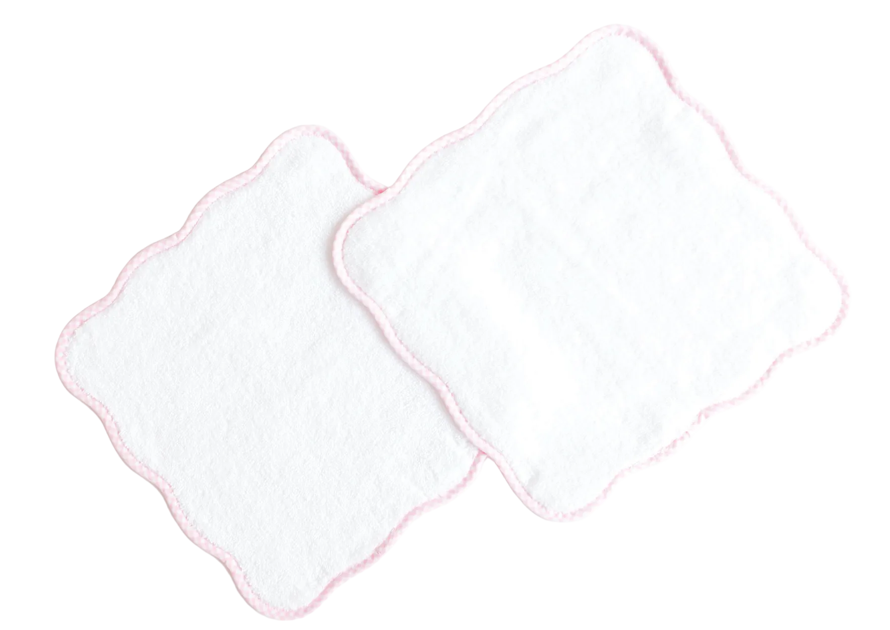 Terry Tots Wash Cloth Set: Two square, white plush wash cloths with scalloped edges and delicate light pink stitching, slightly overlapping on a white background—ideal for gentle cleansing.