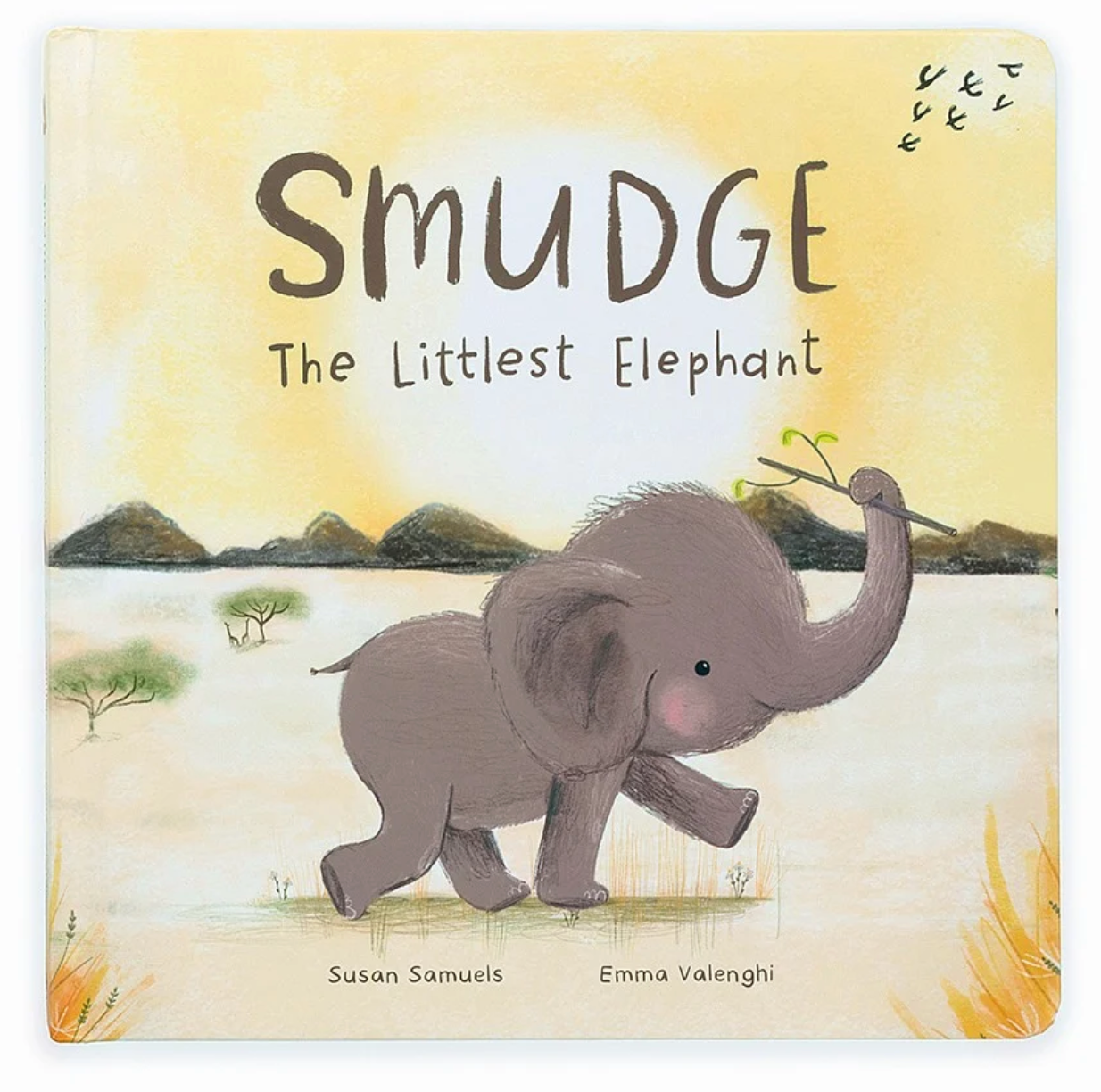 A Jellycat Smudge The Littlest Elephant Book cover titled "Smudge The Littlest Elephant" by Susan Samuels and Emma Valenghi, featuring an illustration of a small elephant holding a twig walking in a savannah setting—a delightful rhyming story perfect for young readers.