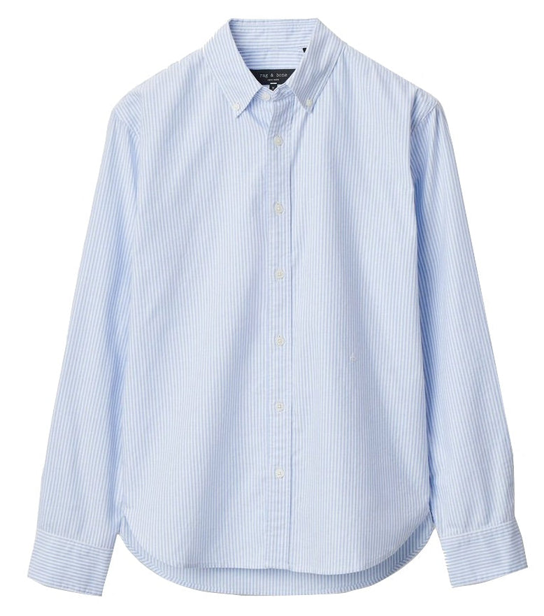 The Rag & Bone Classic Oxford Shirt features light blue and white vertical stripes, a collar, classic fit, and long sleeves. Made from yarn-dyed cotton, it is shown on a white background.