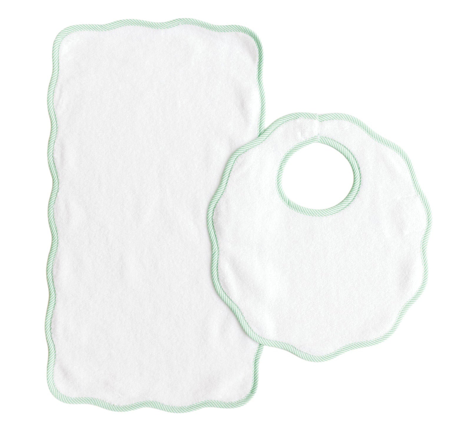 The Bib & Burp Set from Terry Tots features a white rectangular burp cloth and a round scalloped-edge bib with green trim, both displayed on a white background—perfect companions for everyday feeding moments.