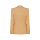 The Renegade Charmer Blazer by Blaze Milano in sand linen is shown from the back, highlighting its long sleeves and cuff button details.