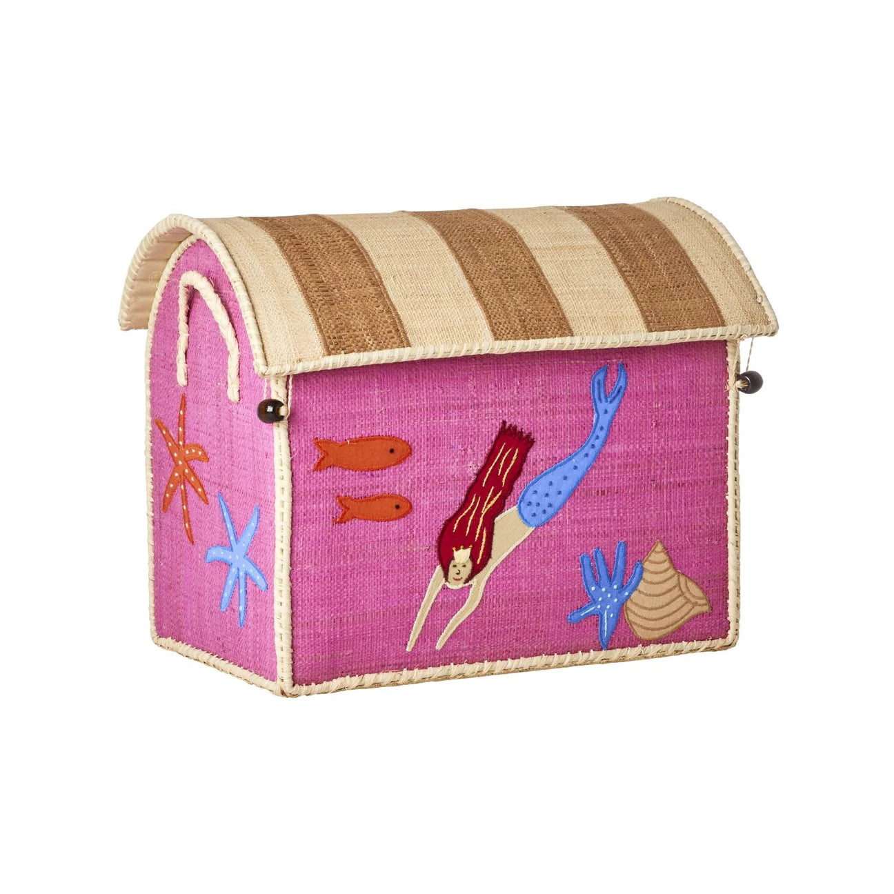 Introducing the Rice Raffia Toy Basket: a pink woven chest featuring a striped lid with delightful mermaid, fish, starfish, and shell designs. Meticulously crafted by skilled artisans in Madagascar using natural materials, this exquisite piece perfectly showcases the beauty of Raffia storage baskets.