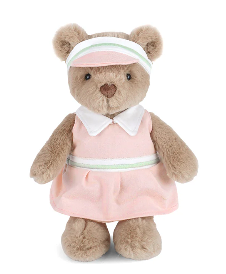 Birdie Golf Bear by Mon Ami is a plush teddy bear dressed in a pink dress with a white collar and a coordinating pink visor featuring green and white stripes, standing upright—an adorable addition to any golf plush collection.