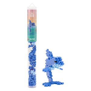 The Plus Plus Tube - Dolphin features a completed blue dolphin model, showcasing this creative building set that's perfect for sea-themed imaginative play.