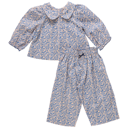 The Pink Chicken Baby Girls' Dawson 2-Piece Set features a blue climbing floral print on soft cotton poplin, with a long-sleeve top with Peter Pan collar and matching loose-fit pants for cozy comfort.