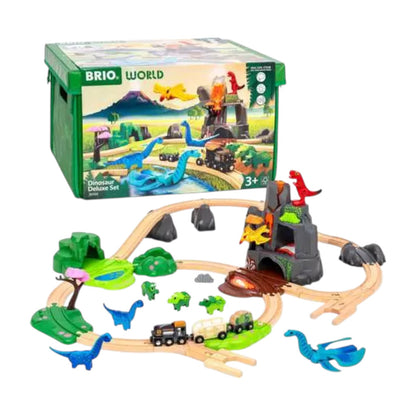 The Brio Dinosaur Deluxe Set features wooden train tracks, dinosaur toys, figurines, and accessories displayed in front of its green storage box—an ideal Jurassic playset for imaginative adventures.