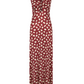 The Horizonte Mistico Ankle Dress by Johanna Ortiz is a sleeveless, long maroon animal print dress featuring a beige abstract spotted pattern in shiny jersey with a gathered knot detail at the bust.