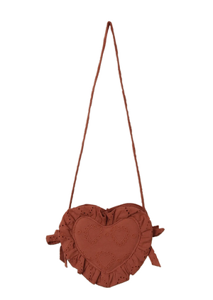 The Noralee Girls' Heart Purse is a heart-shaped brown handbag made from heart eyelet fabric with ruffled edges and embroidered details. This charming accessory features a long thin strap and is shown against a white background.