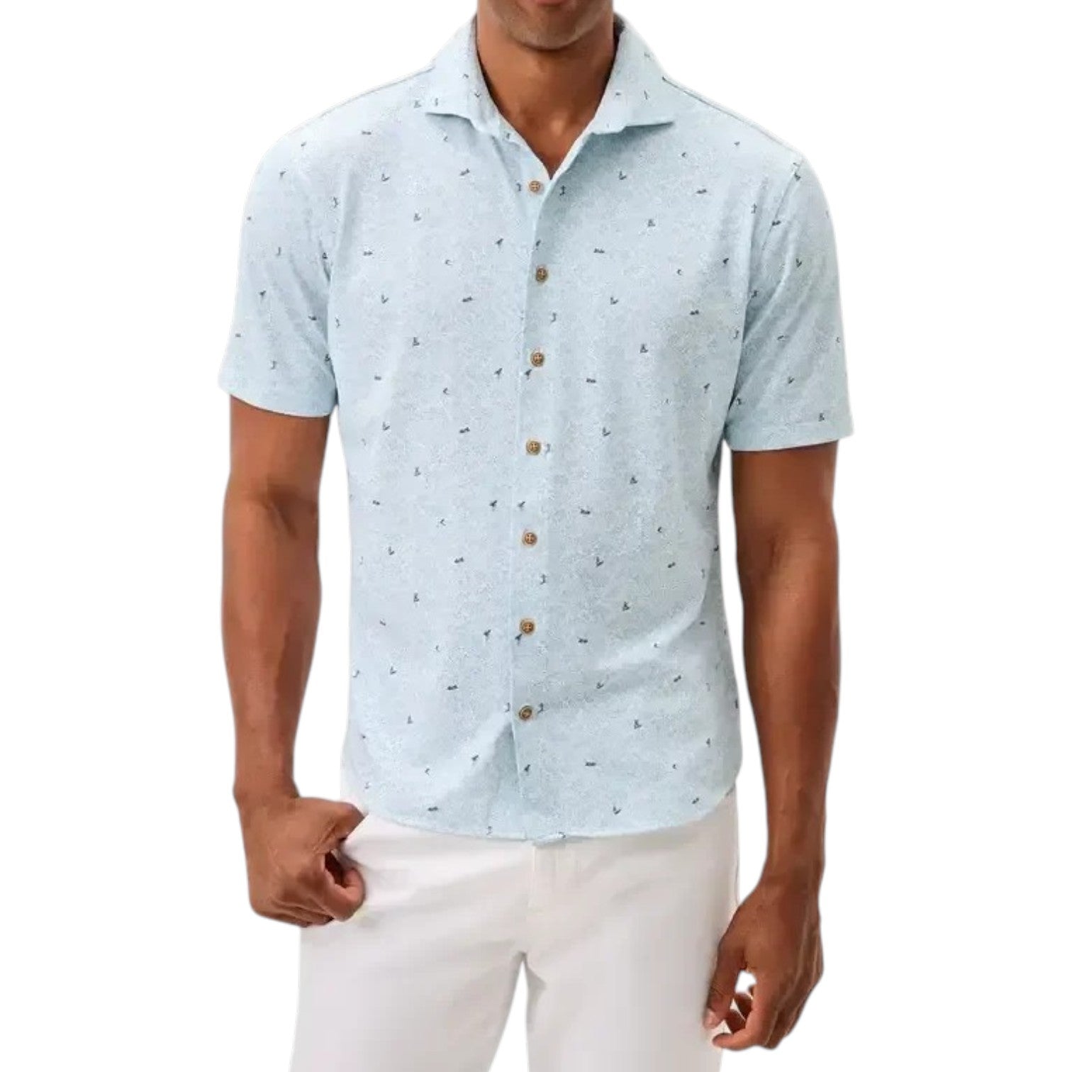 A man wearing a Johnnie-O Rowing Shirt in light blue with short sleeves and a subtle print pattern, paired with white pants, standing against a plain white background.