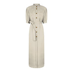 The Rox Star Berber Long Dress by Blaze Milano is a light beige, safari-inspired piece featuring short sleeves, front buttons, chest pockets, and a matching waist tie belt.