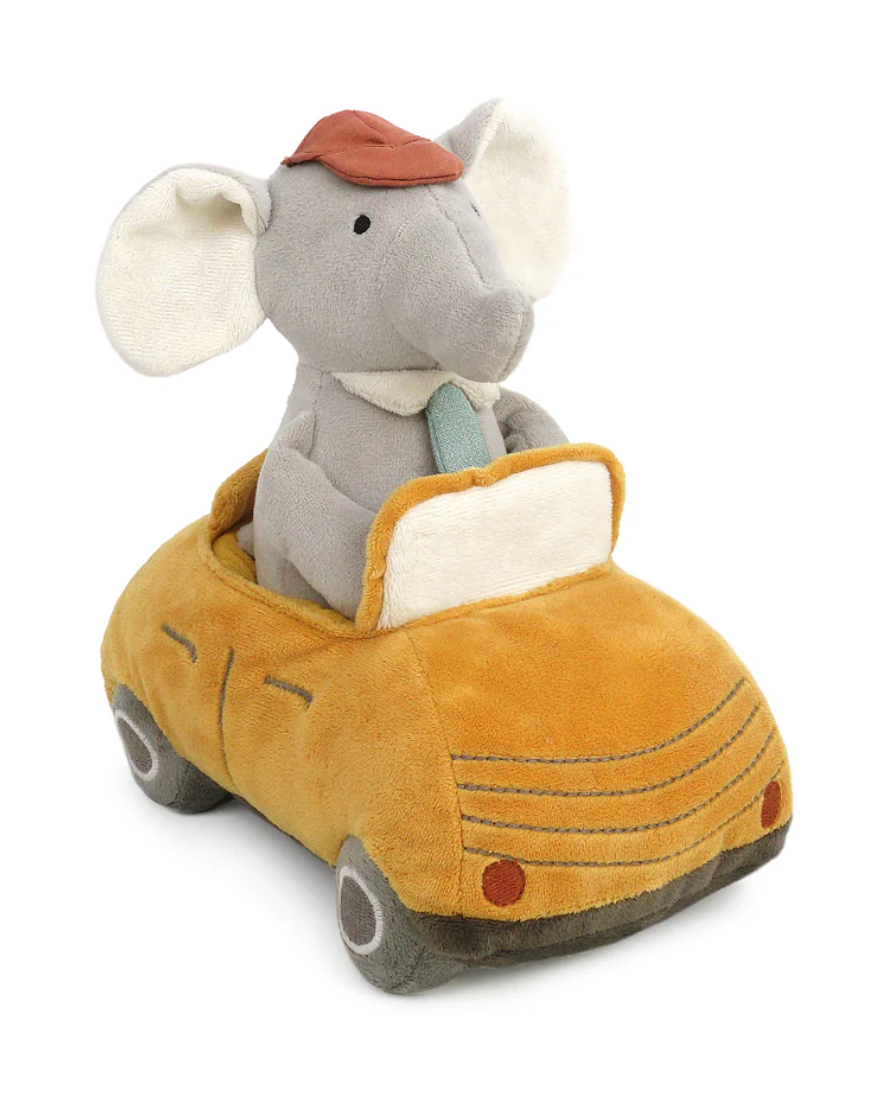 The Mon Ami Elephant Driver is a delightful two-in-one plush, featuring an adorable elephant wearing a red cap and blue tie as it sits in a yellow plush car. The removable stuffed toy design adds playful versatility to this charming product.