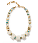 The Granada Necklace by Lizzie Fortunato features large white square beads, gold spacers, and small round white and Arizona turquoise beads, finished with a gold chain and clasp.