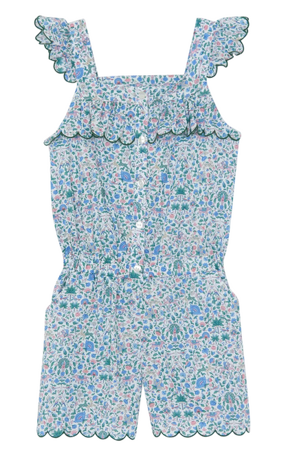 The Girls’ Liberty Print Short Jumpsuit by Tartine et Chocolat is a floral-patterned, sleeveless cotton romper for children, featuring ruffled straps, a button front, scalloped edges, and an elastic waist in predominantly blue, green, and pink hues—perfect for summer.