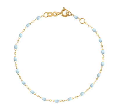 Introducing the Gigi Clozeau Little Gigi Classic Bracelet 5.1", a delicate 18K gold chain with light blue bead accents and a secure clasp.