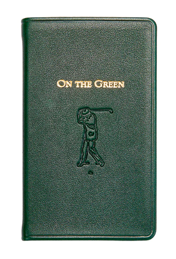 Compact and stylish, the "On the Green Leather Book" by Graphic Image is a green leather golf log book featuring an embossed golfer and the title "On the Green" in gold lettering. It's an ideal gift for golfers who wish to track their game with elegance.