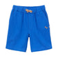 The Boys' Cotton Rustic Bermuda Short by Arsene & Les Pipelettes is crafted from textured cotton in a vibrant blue, featuring an elasticated waist with a small decorative bow at the center and "AP" embroidery on one side pocket.