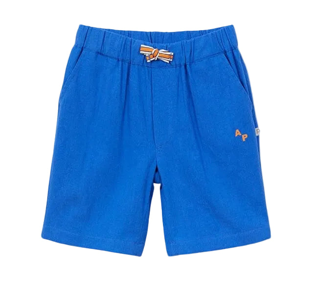 The Boys' Cotton Rustic Bermuda Short by Arsene & Les Pipelettes is crafted from textured cotton in a vibrant blue, featuring an elasticated waist with a small decorative bow at the center and "AP" embroidery on one side pocket.