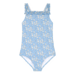 Laid flat on a white background, the Minnow Girls' Capel Ruched Strap One Piece is a light blue swimsuit with a white floral print made from Liberty Fabric, featuring ruffled straps and a fully lined design.