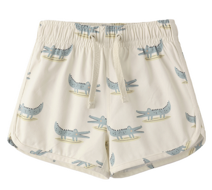 Rylee & Cru Baby Boys' and Boys' Swim Trunk: beige elastic drawstring swim trunks with mesh liner, cartoon blue crocodile pattern, and UPF 50+ sun protection.