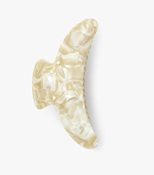 The Machete Jumbo Heirloom Claw is a cream-colored, marbled hair clip made from glossy Italian acetate with curved edges—ideal for holding long or thick hair—shown on a plain white background.