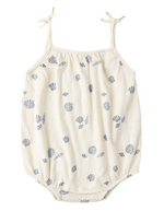 The Baby Girls' Nala Romper by Rylee & Cru features bow straps and blue seashells on soft white cotton jersey, with snaps at the bottom for easy changing.