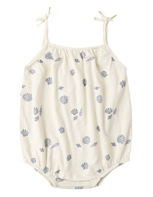 The Baby Girls' Nala Romper by Rylee & Cru features bow straps and blue seashells on soft white cotton jersey, with snaps at the bottom for easy changing.