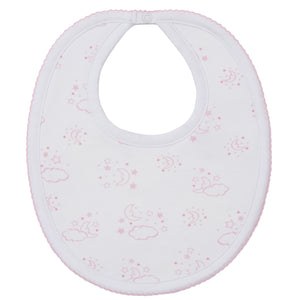 The Kissy Kissy Cheerful Good Night Printed Bib is crafted from soft Pima cotton, features pink clouds, moons, and stars on white with a light pink trim, and fastens at the neck with a snap closure.