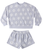 The Baby Girls' and Girls' Karli Set by Rylee & Cru is a light purple terry cloth loungewear set with a long-sleeve top and shorts, featuring a white floral pattern—ideal for relaxed summer days.