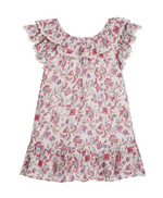 The Girls’ Natiyana Dress by Louise Misha is a sleeveless cotton dress adorned with a charming pink and blue floral pattern, featuring ruffled collar and hem with delicate lace trim, shown against a white background.
