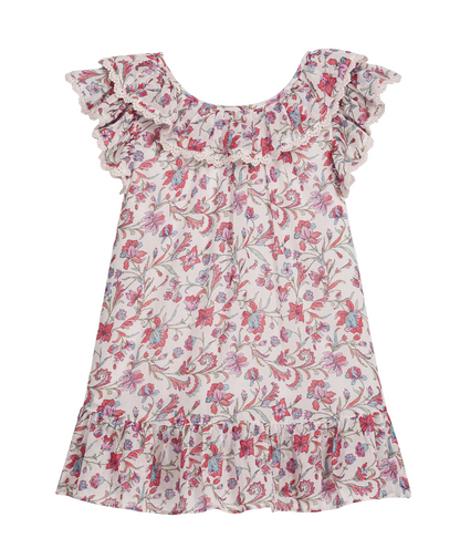 The Girls’ Natiyana Dress by Louise Misha is a sleeveless cotton dress adorned with a charming pink and blue floral pattern, featuring ruffled collar and hem with delicate lace trim, shown against a white background.