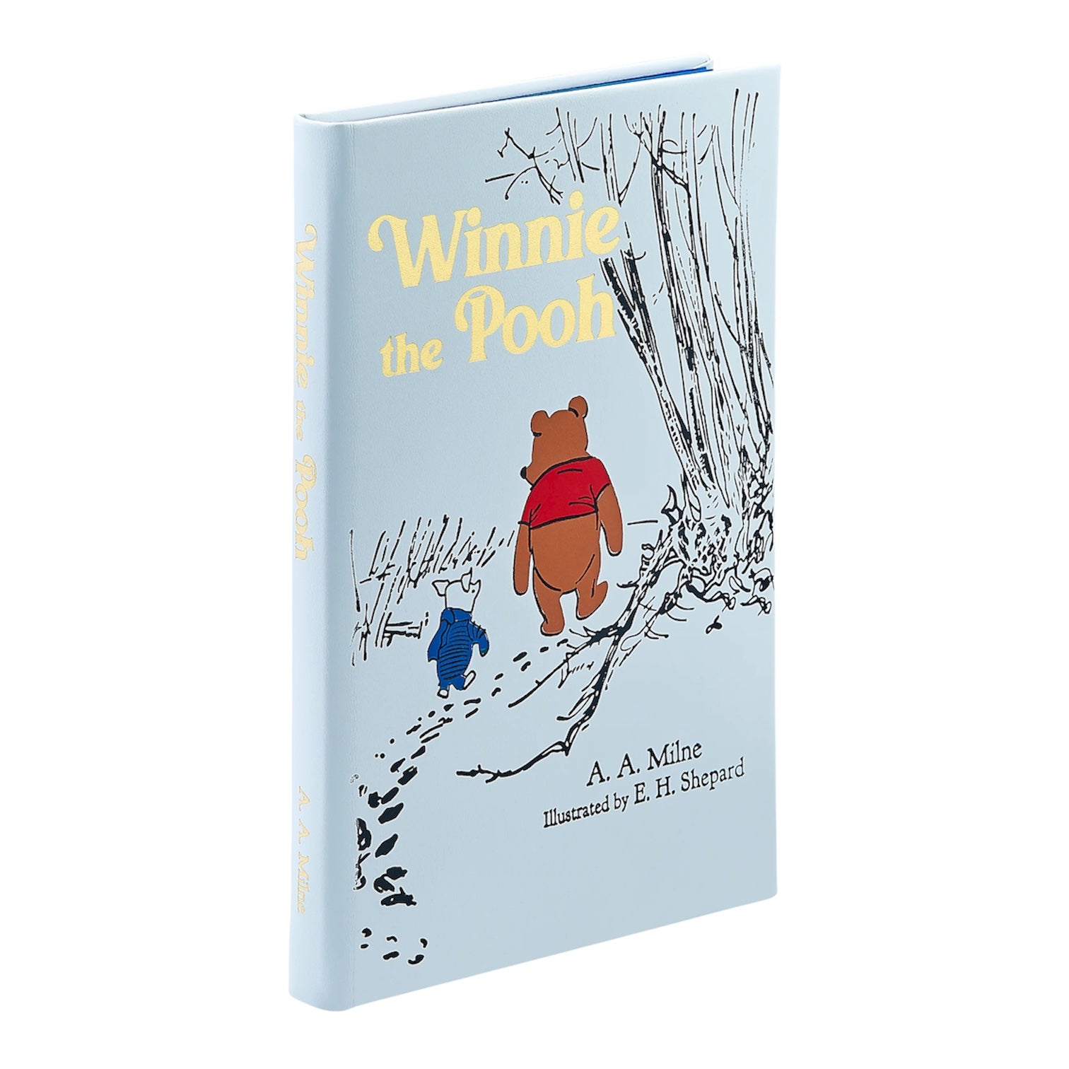 A hardcover edition of "Winnie the Pooh" by Graphic Image, featuring E. H. Shepard’s classic illustrations of Pooh and Piglet walking together under trees.