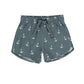 Rylee & Cru Baby Boys' & Boys' Swim Trunk in gray with a drawstring waist, white anchor print, UPF 50+ protection, and rounded side hems is shown on a white background.