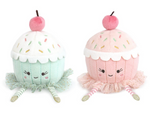 The Mon Ami Cupcake Dancing Duo features two cheerful plush cupcakes with pastel hues, cherry toppers, and tulle accents—the perfect whimsical gift for any occasion.