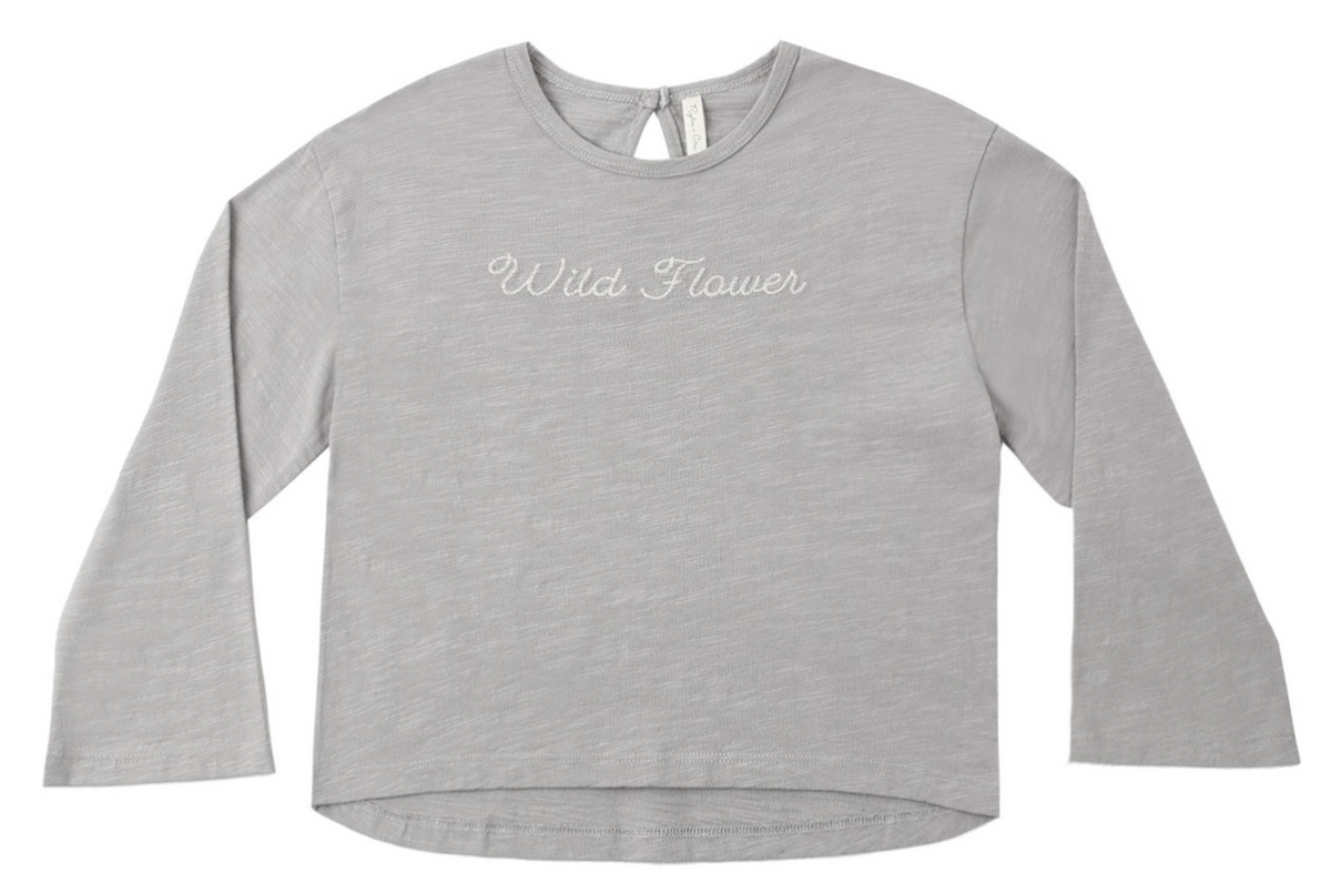 A light gray Girl’s Luna Long Sleeve by Rylee & Cru, featuring “Wild Flower” embroidered in white cursive on the chest, a relaxed silhouette, and shown flat on a white background for an effortless everyday look.