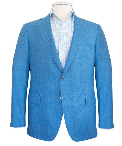 A Samuelsohn Bennet Contemporary Fit Blazer with a checkered dress shirt underneath, showcased on a mannequin, exemplifies hand-tailored production.