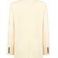 Back view of the Savannah Everyday Blazer by Blaze Milano in cream, made from a silk and linen blend, with cuff button details and a center seam.