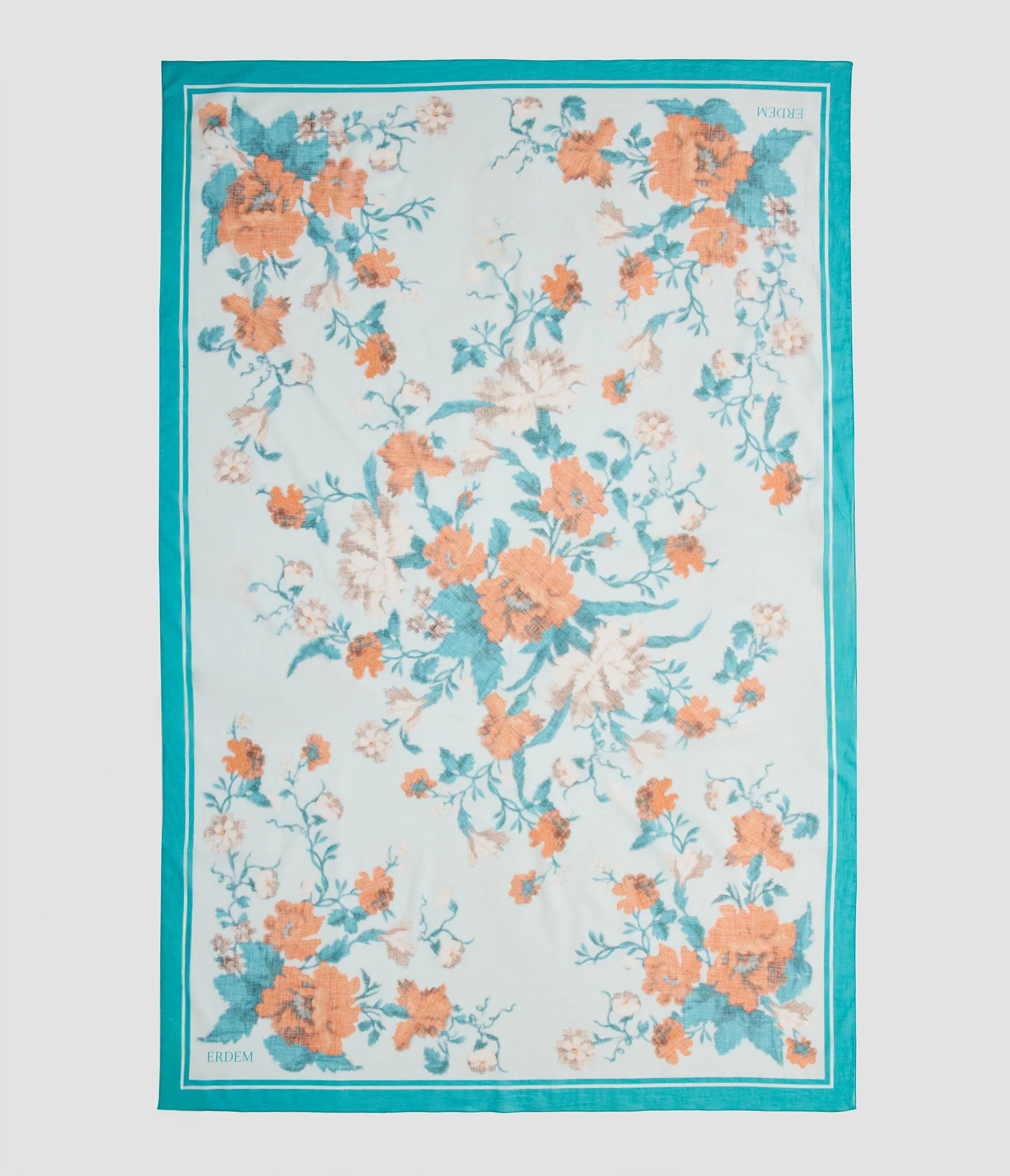 The Trailing Poppy Pareo by Erdem is a rectangular light blue silk-modal scarf featuring an orange and teal poppy print, teal border, and "FORUM" and "FÓRUM" in the corners.