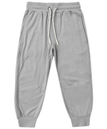 The Boys’ Century Tech Jogger by Rylee & Cru is shown flat against a white background, featuring a light gray color, relaxed fit, elastic waistband with a white drawstring, side pockets, and ribbed cuffs.