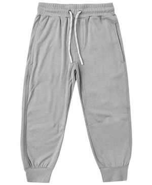 The Boys’ Century Tech Jogger by Rylee & Cru is shown flat against a white background, featuring a light gray color, relaxed fit, elastic waistband with a white drawstring, side pockets, and ribbed cuffs.