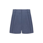 Front view of Blaze Milano Midday Sun Selle Shorts—high-waisted, blue tailored wide leg with pleats and belt loops—shown on a plain white background.