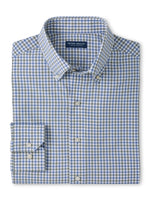 Peter Millar Clarence Performance Poplin Sport Shirt in a blue and grey checkered pattern with a button-down collar, cuffed sleeves, and four-way stretch.