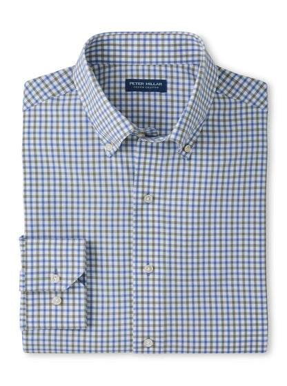 Peter Millar Clarence Performance Poplin Sport Shirt in a blue and grey checkered pattern with a button-down collar, cuffed sleeves, and four-way stretch.